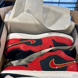 Jordan Red and Black Sneakers with Gold Accents